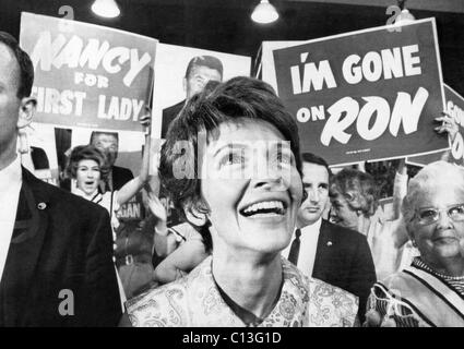 Future First Lady Nancy Reagan at the Republican National Convention, watching the demonstration following Ronald Reagan's nomination as Republican presidential candidate. Signs read 'I'm Gone on Ron' and 'Nancy for First Lady', Miami, Florida, August 7, 1968 Stock Photo