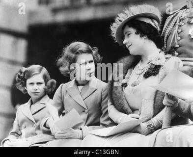 Queen Elizabeth (right), the former Duchess of York, and her children, Princess (and future Queen) Elizabeth II (center), and Princess Margaret Rose (left), circa 1938. Stock Photo