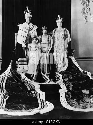 British Royal Family. From left: British King George VI, Future Countess of Snowdon Princess Margaret, Future British Queen Princess Elizabeth, British Queen Elizabeth (future Queen Mother), on the King's coronation, Buckingham Palace, May 12, 1937. Stock Photo
