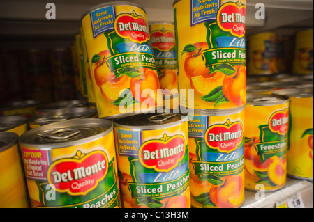 Cans of Del Monte Foods canned fruit are seen on a supermarket shelf in New York Stock Photo