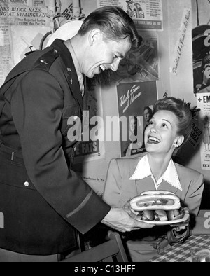 Ronald Reagan and wife Jane Wyman at a special dug out party, 10/31/42 Stock Photo