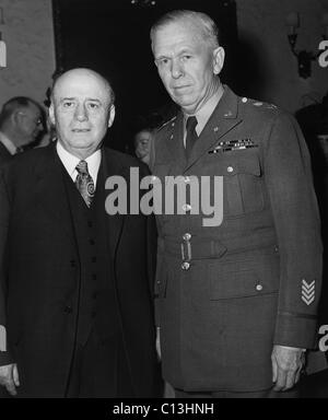 House Speaker Sam Rayburn, with General of the Army George C. Marshall, at a pre-imauguration party attended by prominant Texans in Washington, January 19, 1945. Stock Photo