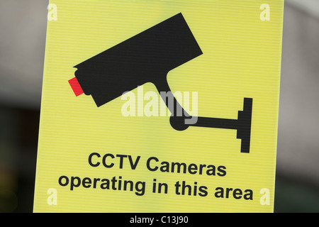 CCTV sign warning of camera in operation,UK Stock Photo