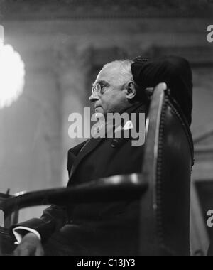 Candid photo of Felix Frankfurter as members of the Senate Judiciary Subcommittee consider his fitness for the U.S. Supreme Court, on January 12, 1939. Felix Frankfurter (1882-1965), was an Associate Justice of the United States Supreme Court from 1939-1962. Stock Photo