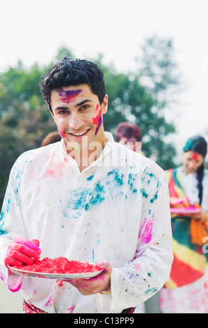 Portrait of a man celebrating Holi Stock Photo