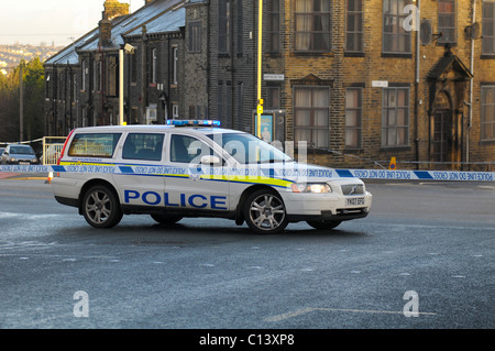 Police car blocks the road after an accident Stock Photo