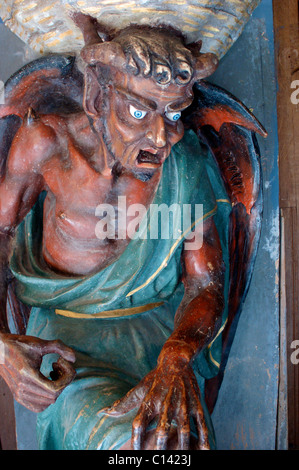 Rennes-le-chateau France devil carving Asmodeus limping devil, interior Sainte Marie-Madeleine church Stock Photo