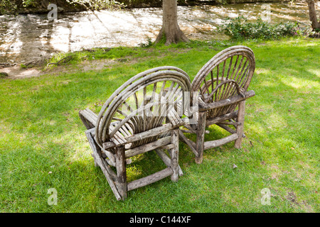 Bent willow wood chairs on lawn, Big Sur Inn, Big Sur, California Stock Photo