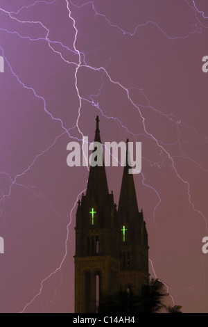 The Basilica of Our Lady of Perpetual Help church steeples in the Mission Hill neighborhood of Boston during a thunderstorm. Stock Photo