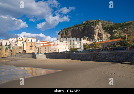 Beach at Cefalu town with La Rocca mountain in background Tyrrhenian coast Sicilia Italy Europe Stock Photo