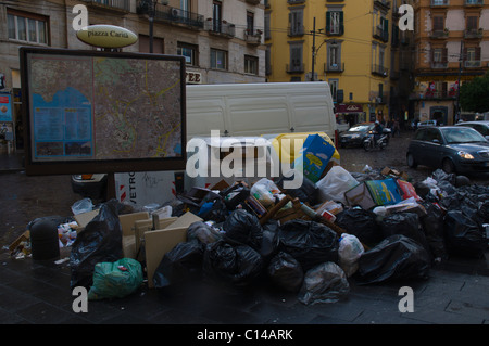 Uncollected trash due to strike at Piazza Carita square central Naples Campania Italy Europe Stock Photo