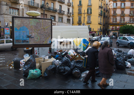 Uncollected trash due to strike at Piazza Carita square central Naples Campania Italy Europe Stock Photo