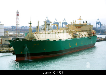 LNG tanker OYO alongside Barcelona Harbour dischaging cargo Stock Photo