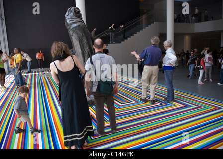Art lovers viewing art at the Museum of Modern Art in Manhattan, New York City, USA Stock Photo