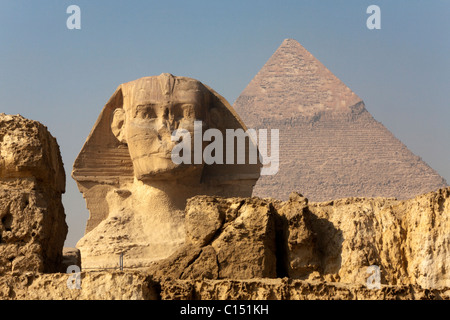 The morning smoke clears to view both the Sphnix and Pyramid in Giza, Egypt Stock Photo