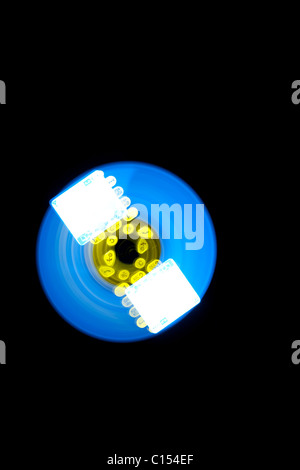 Dect phone with blue and yellow light traces Stock Photo