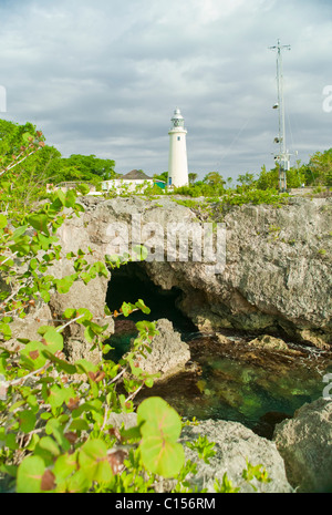 Solar Powered Lighthouse above cave, Jamaica Stock Photo