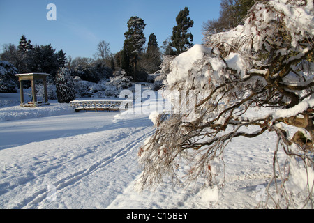 Cholmondeley Castle Gardens. Picturesque winter view of Cholmondeley Castle Temple Water Garden. Stock Photo