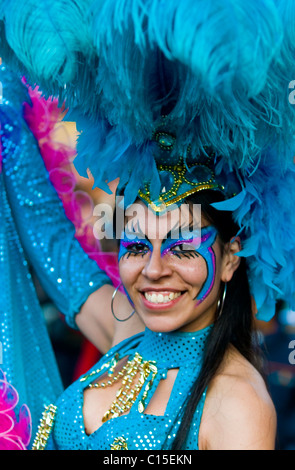 A costumed carnaval dancer in the annual national festival of Uruguay
