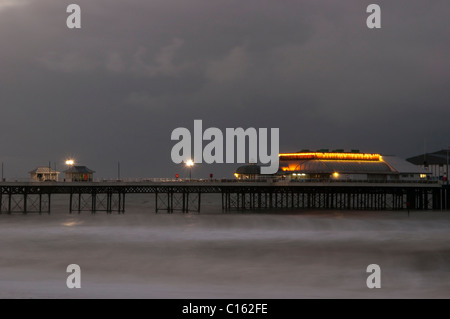 Cromer pier and sea front winter Dusk night Stock Photo