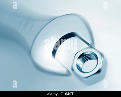 Screw-wrench and nut Stock Photo