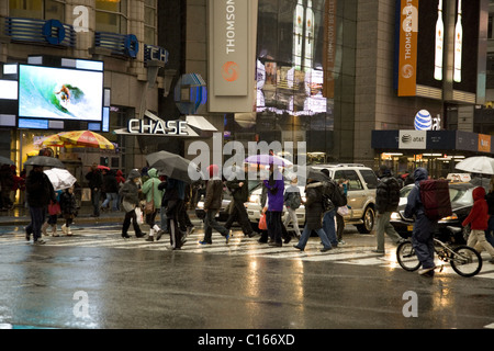 Rainy day in NYC. 42nd Street & 7th Ave., Times Square. Stock Photo
