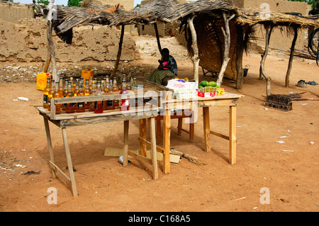 Makeshift stall for cooking oil and daily supplies, Po, southern Burkina Faso, West Africa Stock Photo