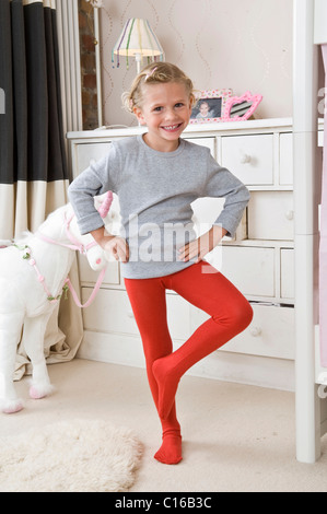 Girl wearing tights in her room Stock Photo, Royalty Free Image ...