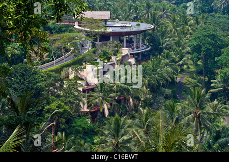 The luxury Four Seasons Hotel set amongst the rice paddies at Sayan in the Ayung River Valley in Bali, Indonesia Stock Photo