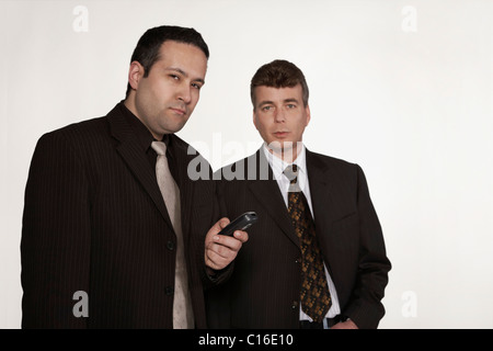 Two businessmen looking at the camera Stock Photo