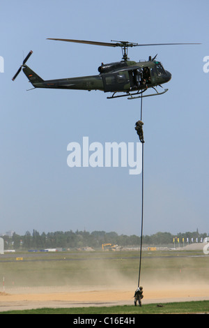 Budeswehr, German Federal Defense Force soldiers abseiling from a helicopter, ILA 2008, Schoenefeld Airport, Berlin Stock Photo