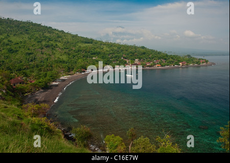 Beautiful Jemeluk Bay in the Amed area of east Bali, Indonesia, is a fishing village and tourist area perfect for diving. Stock Photo