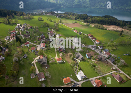 The farming village Matzeldorf over Lake Millstaettersee, aerial view, Carinthia, Austria, Europe Stock Photo