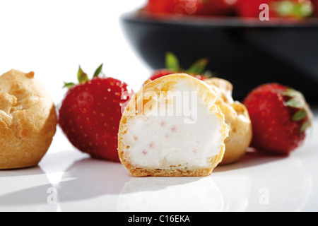 Strawberry cream puffs with strawberries Stock Photo