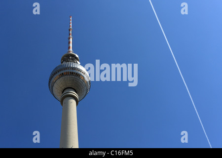 Television tower in Berlin, contrail on blue sky, Berlin, Germany, Europe Stock Photo