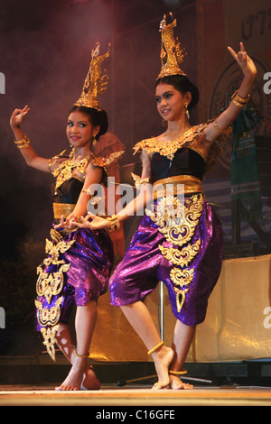 Two young women dancers are wearing beautiful traditional Thai costumes at the Krabi Dance Festival in Krabi, Thailand. Stock Photo