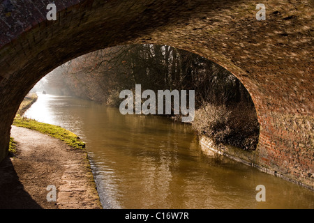 Arch of old brick bridge over the Leicester Line of the Grand Union Canal near Foxton Locks, Market Harborough, Leicestershire