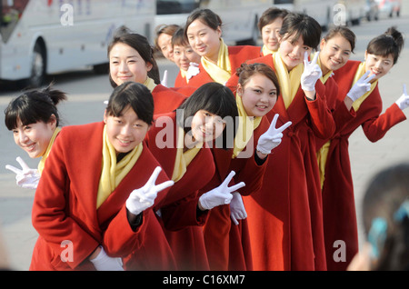 Chinese air hostesses pose in the capital, Beijing.  Beijing, China - 10.03.09  ** ** Stock Photo