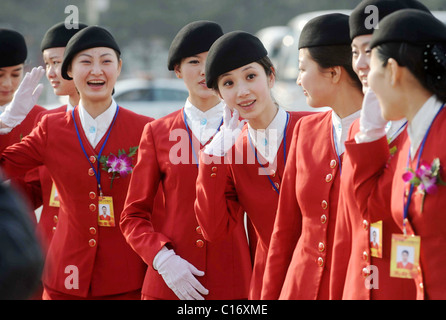 Chinese air hostesses pose in the capital, Beijing.  Beijing, China - 10.03.09  ** ** Stock Photo