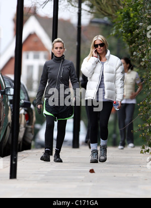 Denise Van Outen goes for a power walk with her trainer, Nicki Waterman. Denise is wearing a 'Red Nose Climb' jacket to promote Stock Photo