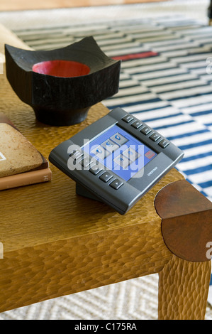 Audio-visual control panel on coffee table Stock Photo