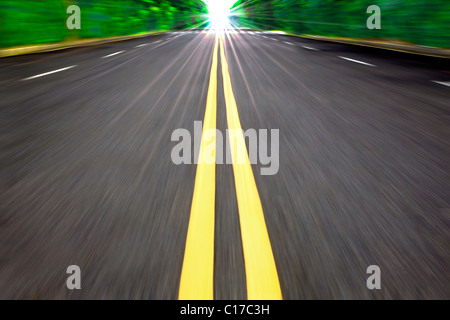High speed driving car on the empty road