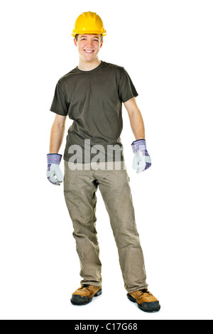 Young construction worker with hard hat full body standing isolated on white background Stock Photo