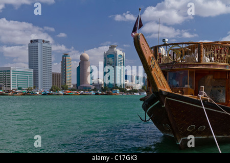 Rustic river Dow boats in Dubai Creek in Dubai, UAE. Stock Photo