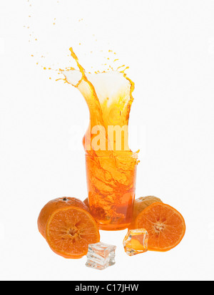 Fruit Juice Glasses Splashing Isolated On White Stock Photo, Picture and  Royalty Free Image. Image 97034990.