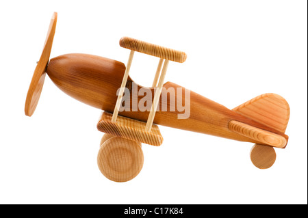 object on white - wooden toy airplane Stock Photo