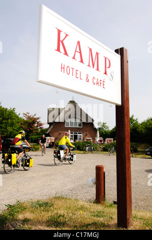 Kamps Hotel & Cafe, signpost, cyclists in Keitum, Sylt island, North Frisia, Schleswig-Holstein, Germany, Europe Stock Photo