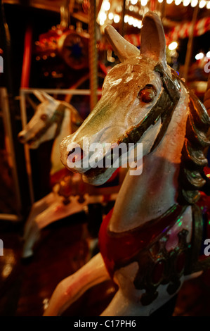 Horses on a children's merry-go-round by night at Wiener Prater, Vienna, Austria, Europe Stock Photo