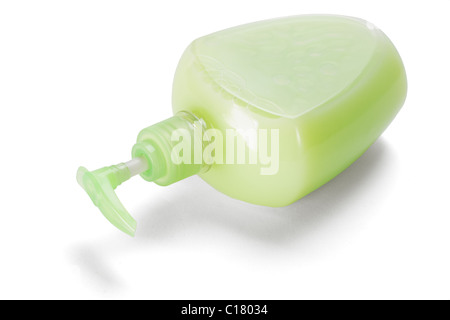 Bottle of hand sanitizer lying on white background Stock Photo