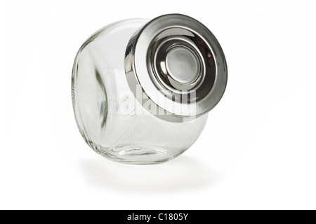 Glass jar for spices with lid on white background Stock Photo